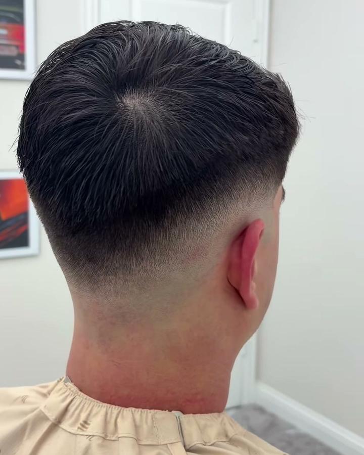 Back view of a mid drop fade